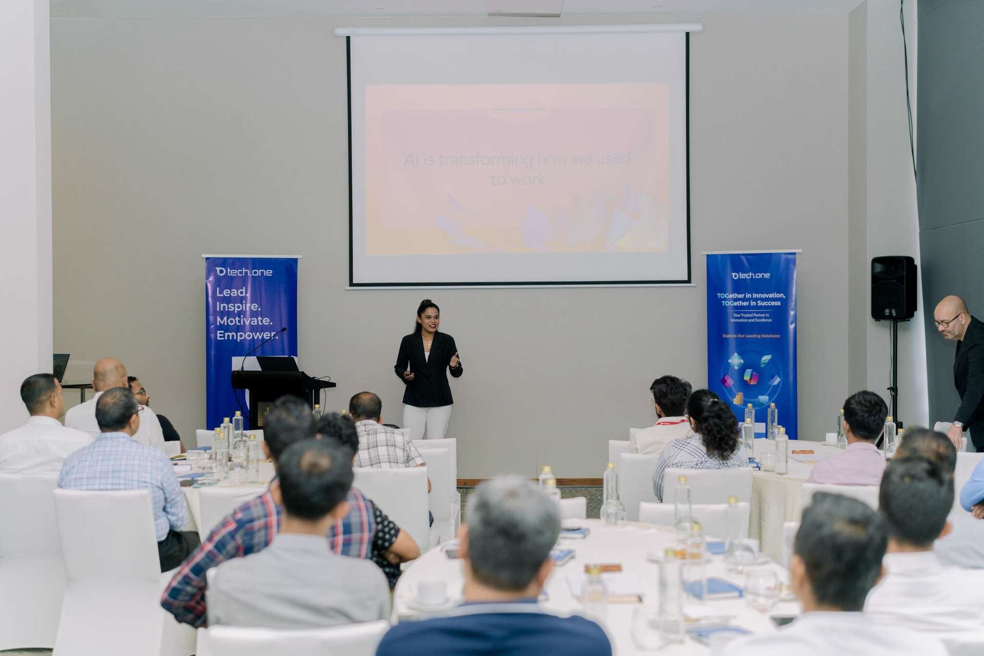 Aisha presenting to enterprise audience - AI productivity workshop